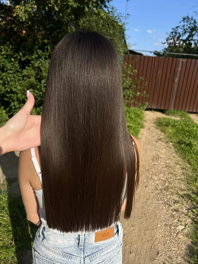 Тёмные длинные волосы после процедуры Yarskix Hair